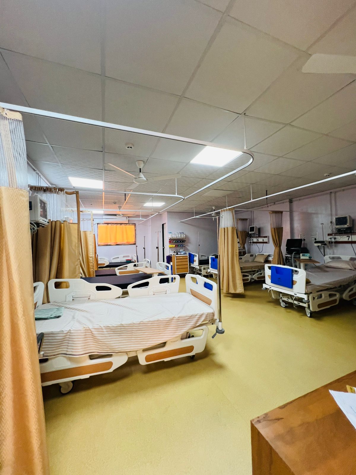 Ward with beds and privacy curtains